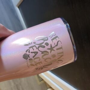 Piper Lou Pink Glitter Tumbler Resting Beach Face